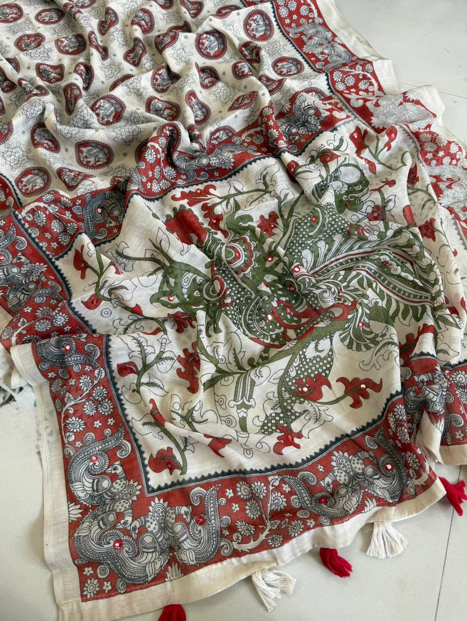 Soft linen kalamkari printed saree with aari mirror work and Taseels.